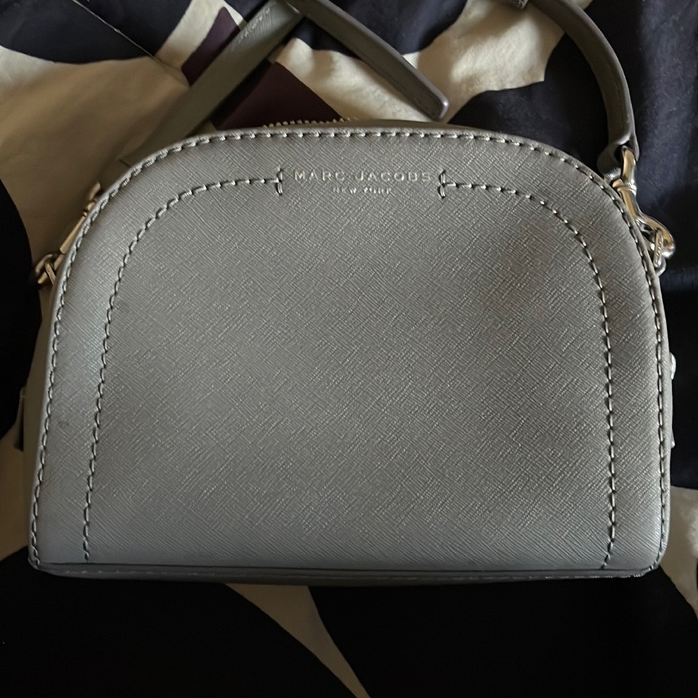 Authentic Marc Jacobs grey clutch with removable strap.